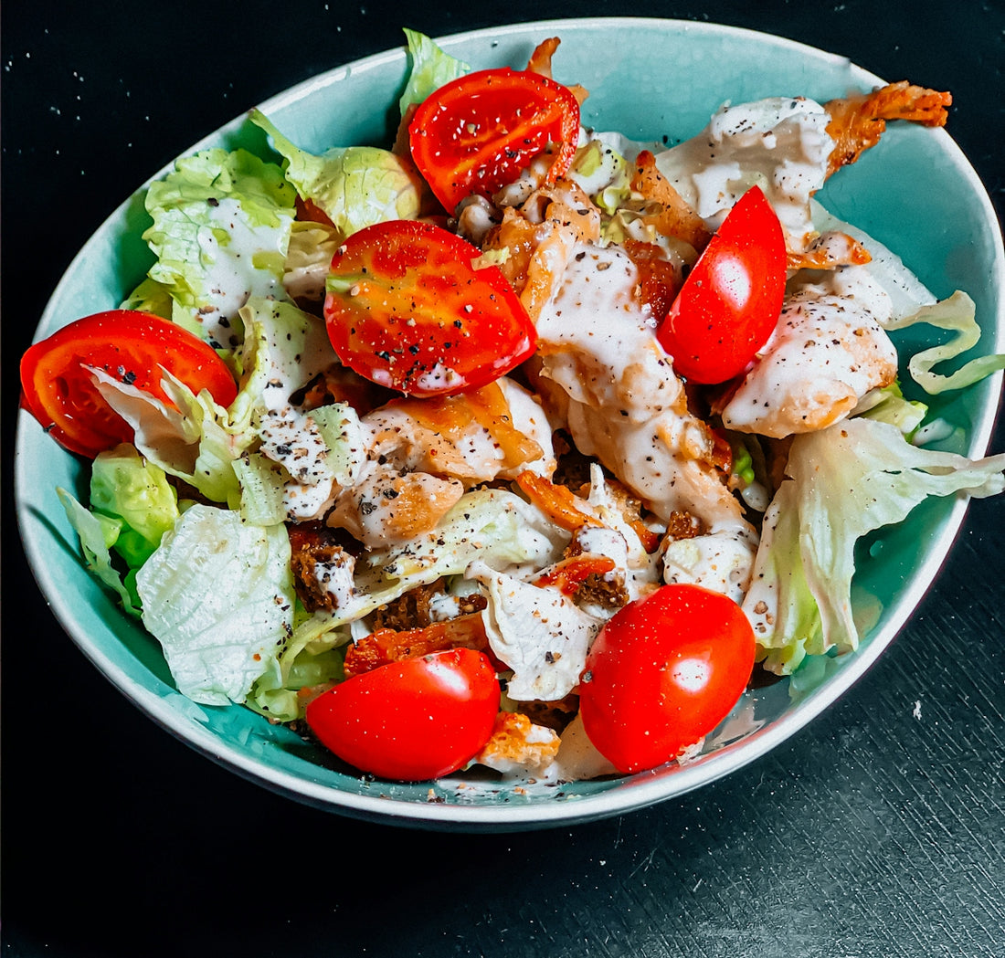 vegetable salad on blue ceramic bowl