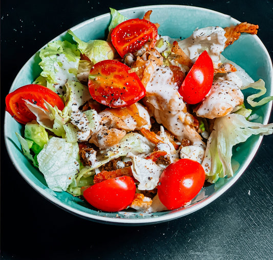 vegetable salad on blue ceramic bowl